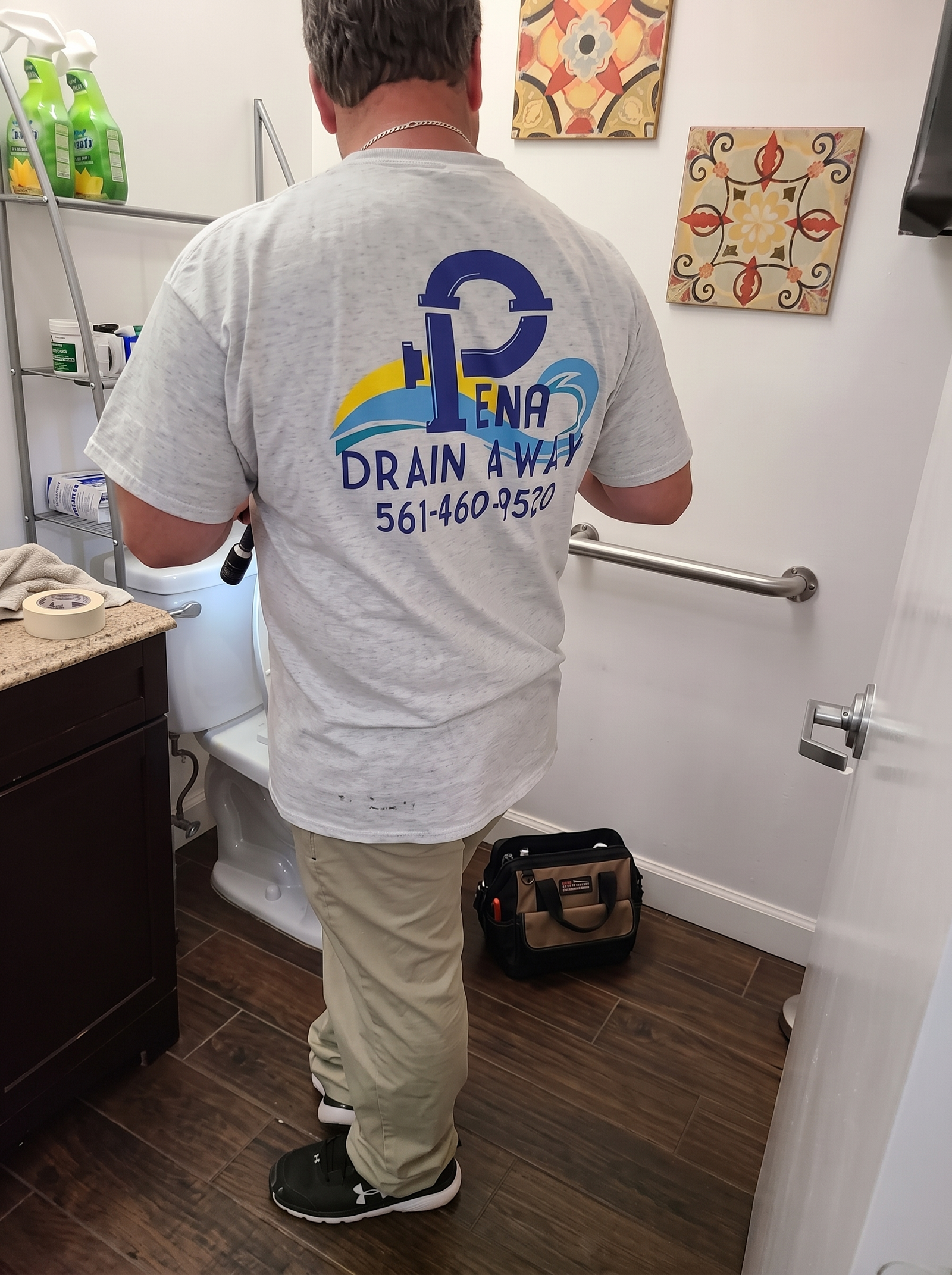 Pena Drain Away plumber working on a residential plumbing repair